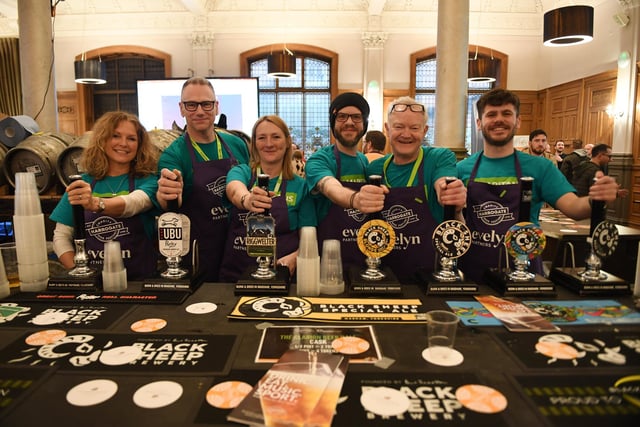 The Samaritans team helping to pull pints at the festival