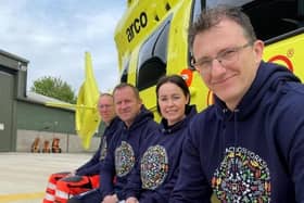Crew members from Yorkshire Air Ambulance sporting their hoodies.