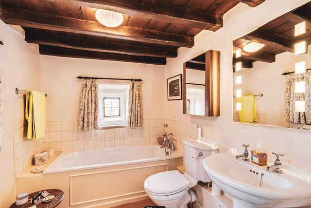 The property boasts five bathrooms with traditional and modern suites.