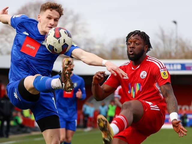 Toby Sims in action during Harrogate Town's 3-1 defeat at Crawley last season. The right-back will miss this Saturday's clash with the Red Devils through injury. Pictures: Matt Kirkham