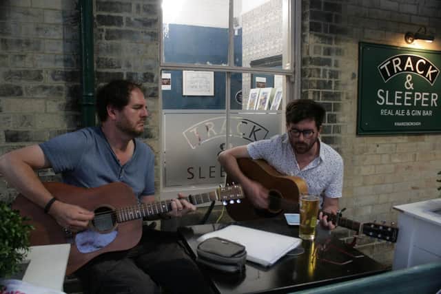 Hidden gem at Knaresborough railway station - The micropub Track & Sleeper is only one of the great independent businesses on the platform. The picture shows popular local musicians Paul Mirfin and Rufus Beckett performing.
