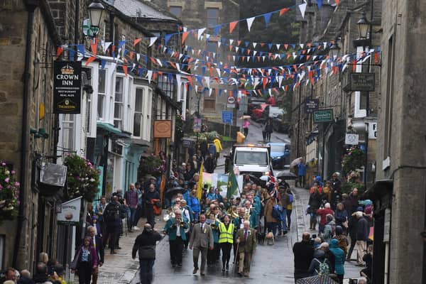 A parade makes its way through Pateley Bridge to the Nidderdale Showground. Picture Gerard Binks