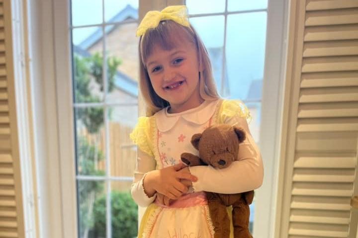 Grace dressed up as Goldilocks from Goldilocks and the Three Bears