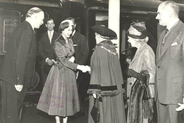 The Queen is pictured arriving at Harrogate train station for the Great Yorkshire Show in 1957.