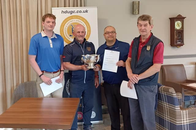 Three Oakdale GC's Division Three Team Championship-winning side being presented with Chadwick Bowl by Harrogate & District Union president Phil Kitching. Picture: Submitted