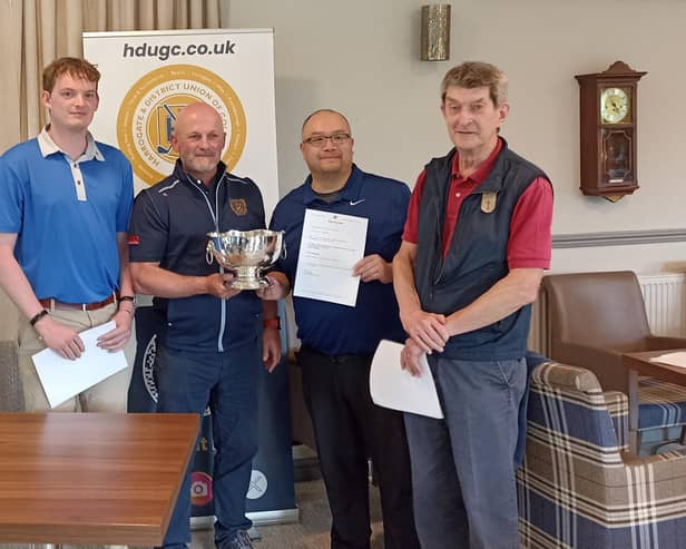 Three Oakdale GC's Division Three Team Championship-winning side being presented with Chadwick Bowl by Harrogate & District Union president Phil Kitching. Picture: Submitted