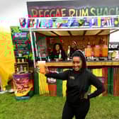 The Riverside Food Festival, Wetherby. Cherrelle Davis (front) with Natasha Lewis and  Saffia Morris from the Reggae Rum Shack Leeds, pictured at the festival.Picture taken by Yorkshire Post Photographer Simon Hulme 5th August 2023










