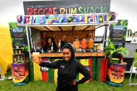 The Riverside Food Festival, Wetherby. Cherrelle Davis (front) with Natasha Lewis and  Saffia Morris from the Reggae Rum Shack Leeds, pictured at the festival.Picture taken by Yorkshire Post Photographer Simon Hulme 5th August 2023










