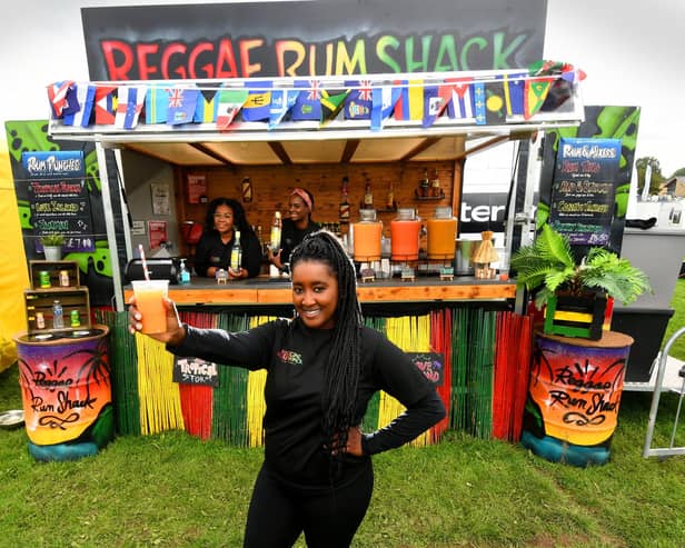 The Riverside Food Festival, Wetherby. Cherrelle Davis (front) with Natasha Lewis and  Saffia Morris from the Reggae Rum Shack Leeds, pictured at the festival.Picture taken by Yorkshire Post Photographer Simon Hulme 5th August 2023










