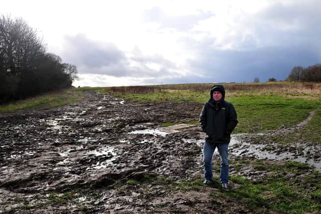 A rare bit of good news amid six years of dust, disruption and road closures - Harrogate Kingsley resident Gary Tremble, standing on land before it became houses. said: "‘After more than six years of pointing out the obvious dangers of Bogs Lane, we finally have a path for pedestrians." (Picture Gerard Binks)