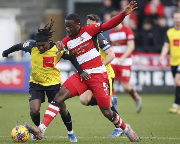 Joseph Olowu and his Doncaster Rovers team-mates struggled to contain Harrogate Town's man of the match, Abraham Odoh. Pictures: Paul Thompson/ProSportsImages