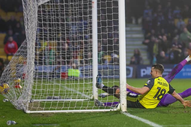 Jack Muldoon slides in to force the ball over the goal-line and earn Harrogate Town all three points.