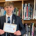Ripon Grammar Maths star William Keens is proud to show off his certificate