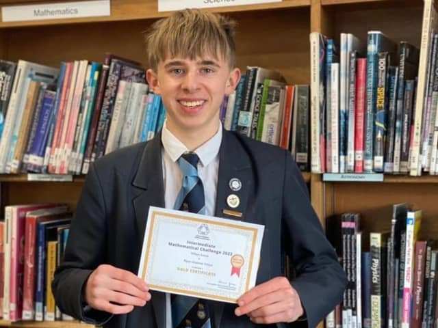 Ripon Grammar Maths star William Keens is proud to show off his certificate