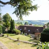 The cottage, with landscaped gardens, has a quiet hamlet location, surrounded by beautiful scenery.