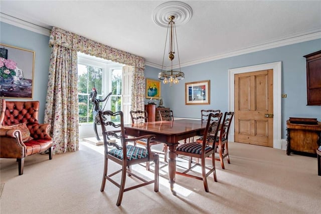 A large and elegant dining room is adjacent to the breakfast kitchen.