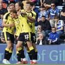 Stephen Duke-McKenna is congratulated by his Harrogate Town team-mates after opening the scoring in the 16th minute of Saturday's League Two win at Gillingham. Picture: Harrogate Town AFC