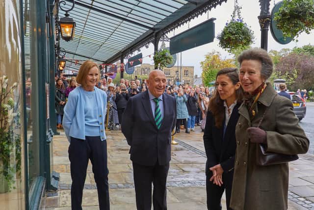 The Woods family, including father William and daughter Sarah, welcome HRH The Princess Royal to their shop in Harrogate. (Picture contributed)
