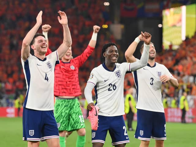Declan Rice, Kobbie Mainoo and Luke Shaw celebrate after England beat the Netherlands during the UEFA EURO 2024 semi-final match.