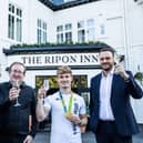 A re-opening toast taken outside the newly refurbished Ripon Inn.