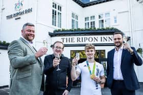 A re-opening toast taken outside the newly refurbished Ripon Inn.