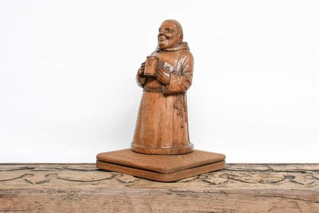 A Robert ‘Mouseman’ Thompson carved oak newel post of the Merry Monk – Estimate: £2,000-3,000