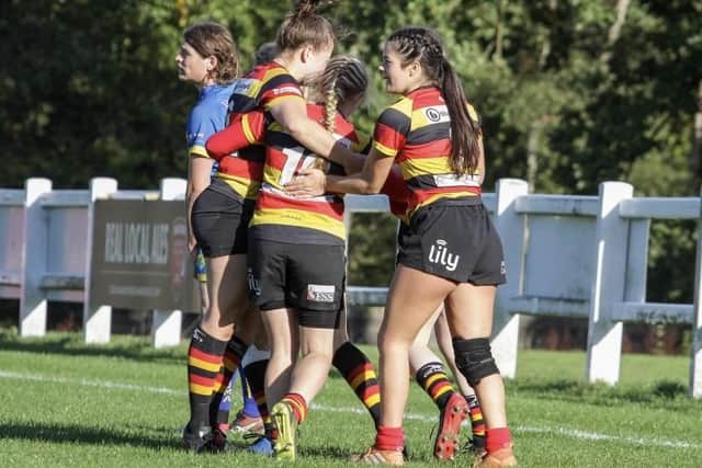 Harrogate's players celebrate one of their four tries against visiting Kenilworth