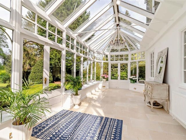 The garden room is a lovely versatile space that has doors to outside.