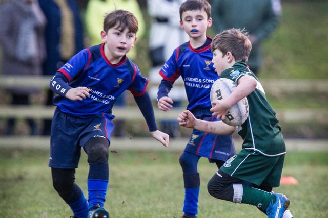 Quinn Telfer on the attack for Hawick Minis against Jed Jaguars