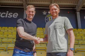 Harrogate Town manager Simon Weaver, left, with goalkeeper Mark Oxley, who has signed a new contract. Picture: Harrogate Town AFC