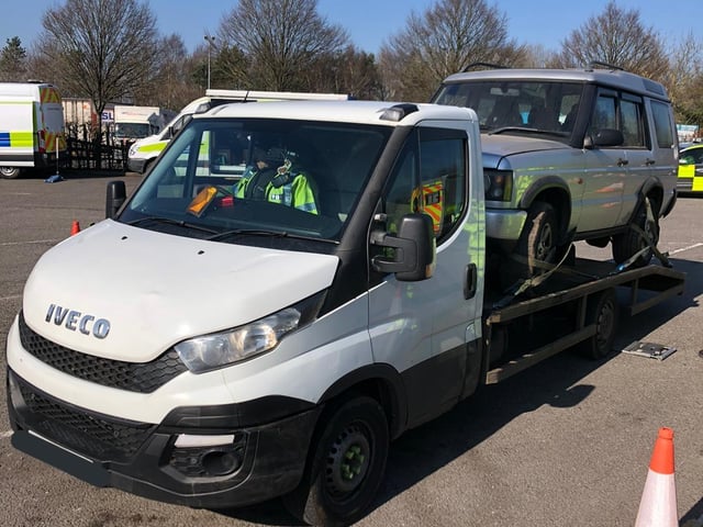 This vehicle transporter was overweight, and the driver was disqualified.