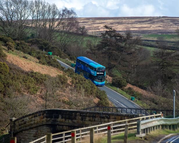 A Coastliner bus approaches Goathland which is on the route of Britain's most scenic bus route, has been saved from the axe with a sudden rush of tourists taking advantage of the £2 fares. Picture by Yorkshire Post Photographer Bruce Rollinson.