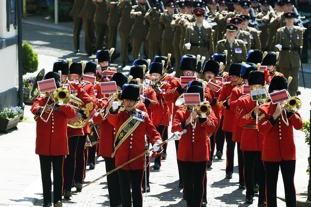 The band leads the parade through the city