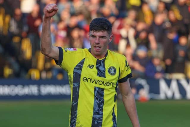 Ellis Taylor celebrates after helping Harrogate Town into a 1-0 lead against Carlisle United at Wetherby Road. Pictures: Matt Kirkham