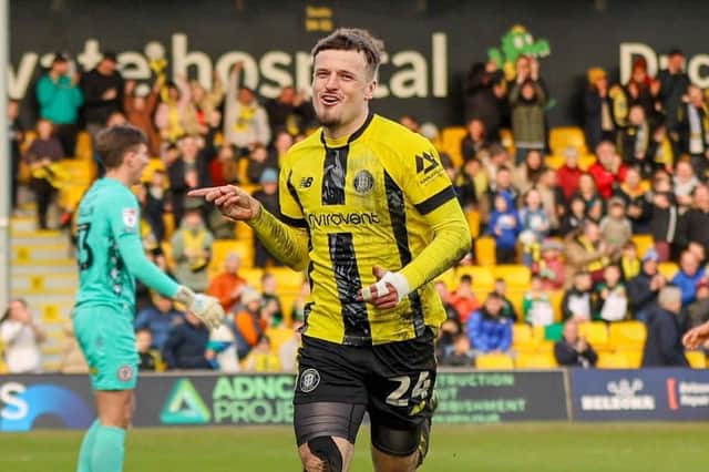 Josh March celebrates after handing Harrogate Town a 2-1 lead in the 58th minute of Saturday's League Two clash with Accrington Stanley. Pictures: Matt Kirkham