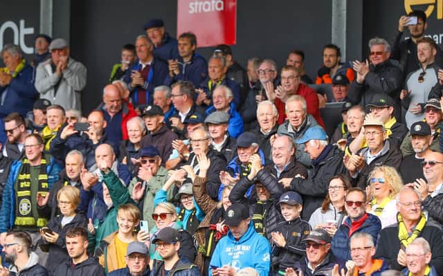 Harrogate Town supporters inside the EnviroVent Stadium during Saturday's League Two defeat to Bradford City. Picture: Matt Kirkham