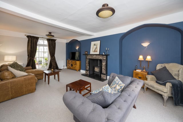 Another of the reception rooms that offer exceptional space and comfort within the property.