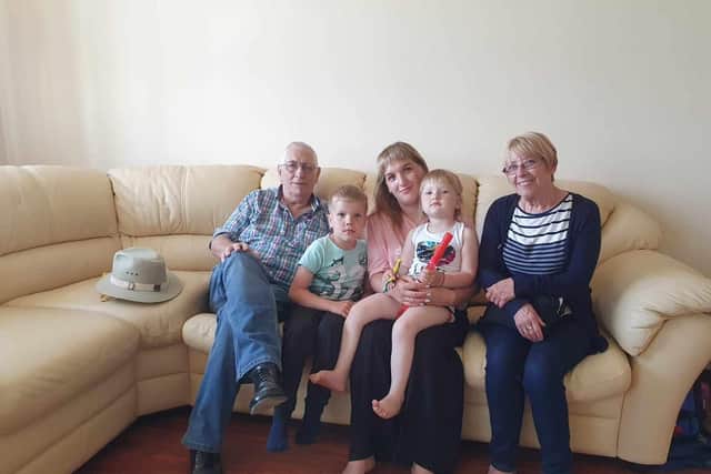 Pictured: from the left - Bob Frendt, Oxsanna, her two children, and Mr Frendt's partner Maureen.