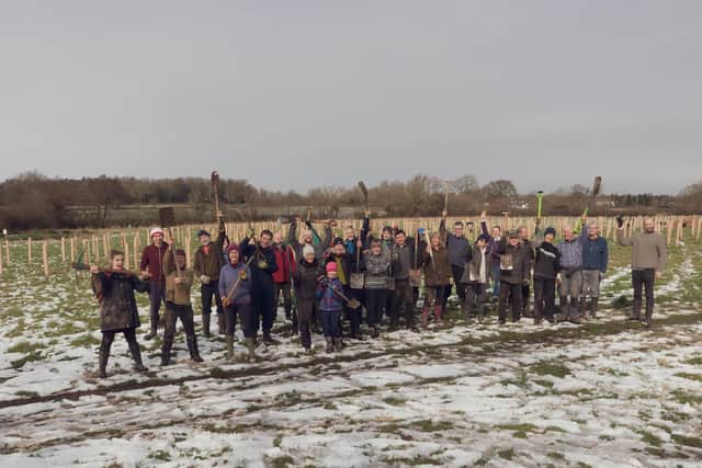 Volunteers celebrate planting 740 trees in one day at Long Lands Common in Harrogate. (Picture Edward Lee)