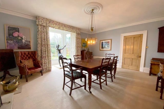 The formal dining room is bright and spacious.