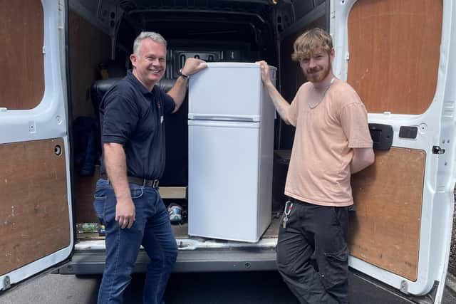 Harrogate Homeless Project staff picking up furniture donated by the public to charity Essential Needs to help someone experiencing homelessness turn the corner.