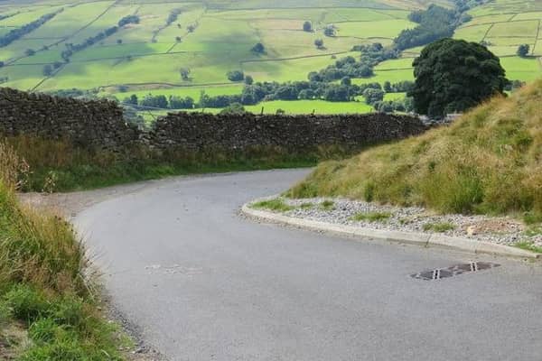 Firefighters have rescued a Paralympian after their bike overturned on a road in the Harrogate district