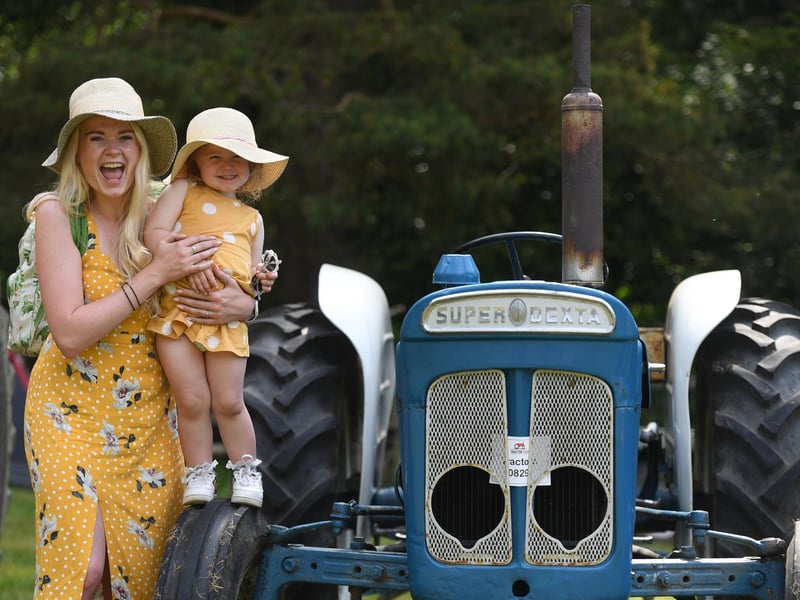 Skylar Davies (aged two) with her mum Emily Davies enjoying the festival in the sunshine at Newby Hall