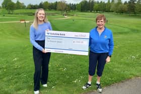 Ripon City Golf Club’s lady captain, Christine Pickard, right, hands over a cheque for £2,000 to Dementia Forward. Picture: Submitted