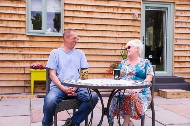 The McCoy family settled in their daughter's garden