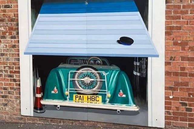 No, it's not a garage door, it's one of Knaresborough's Trompe L’oeils.