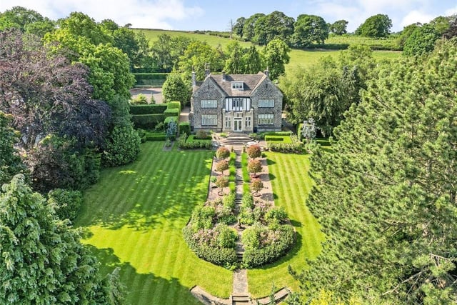 This five bedroom and three bathroom detached house is for sale with Strutt & Parker for £2,100,000