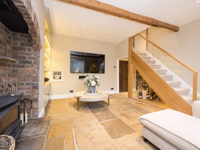 A mix of contemporary and traditional style works well within the farmhouse property.