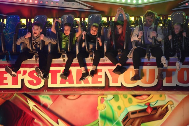 Pictured children enjoy the Miami Fever ride.