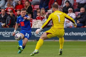 Harrogate Town striker Josh March beats Salford City goalkeeper Alex Cairns during Saturday's 2-2 draw at Moor Lane, but his finish ended up narrowly the wrong side of the post. Pictures: Matt Kirkham